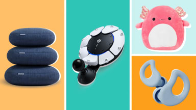 Split image of a blue Quiet Mind pillow, a Sony PS5 Access Controller, a pink Archie the Axolotl Squishmallow, and a pair of gray Curvd noise-reducing earbuds