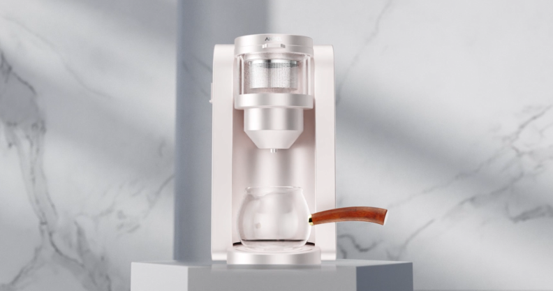 Angel tea brewing machine on white surface