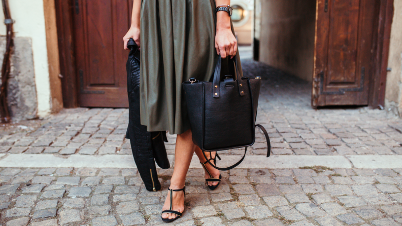 Woman in dress with purse and heels