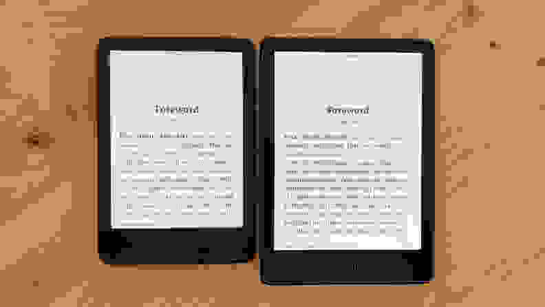 Two Amazon Kindles sit side-by-side to illustrate how much text each of their displays can hold.