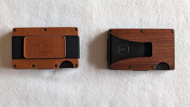 The back of Ridge wallets with a cash strap, left, and money clip attached.