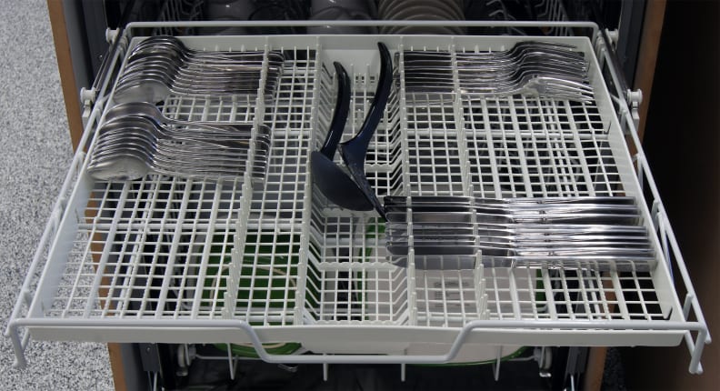 How to load a cutlery basket in a dishwasher?