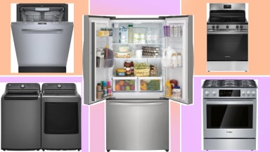 Five large appliances like a refrigerator, range, dishwasher and washing machine on an orange and pink background