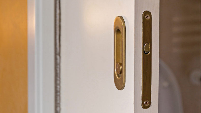 Close up of pocket door hardware.