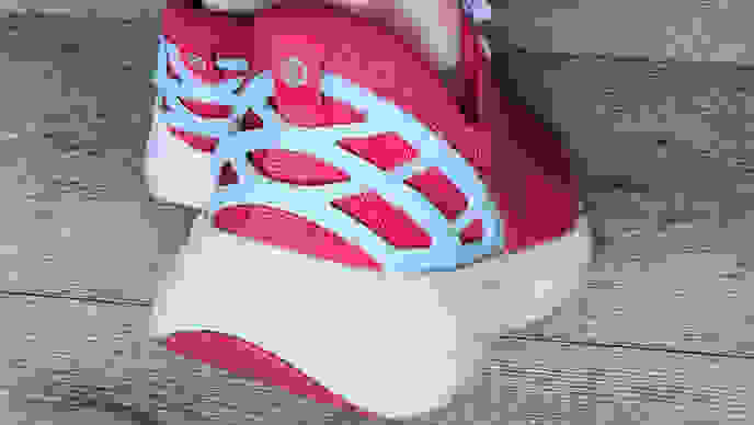 Closeup of Kizik shoe from back, reinforced heel in focus