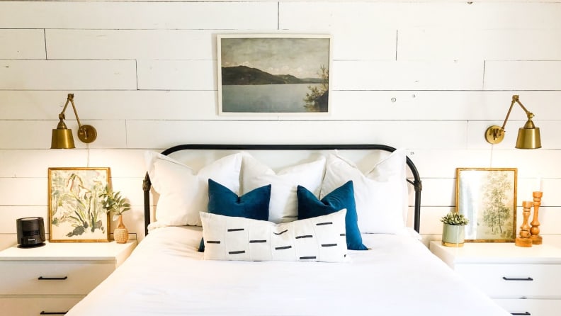 BFF Print Shop print above a made bed between two side tables