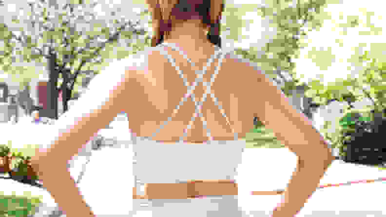 close up of woman wearing Smartwool white top