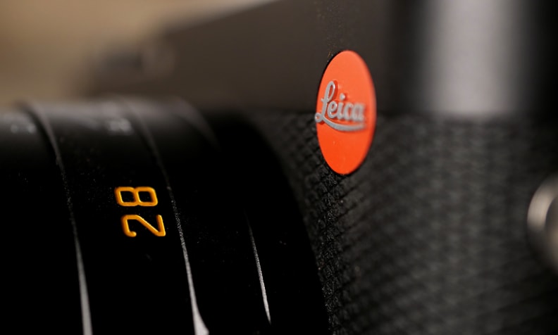A photo of the Leica Q's brand badge.