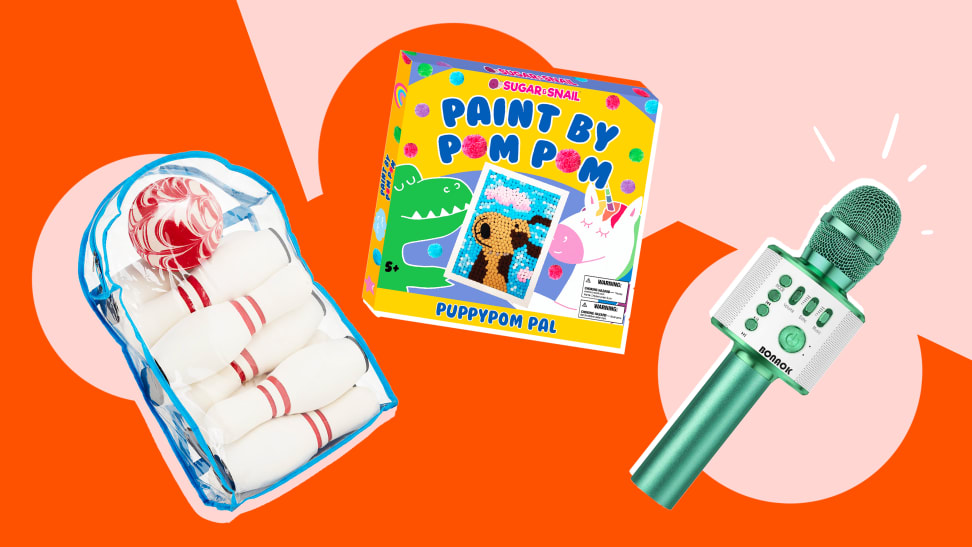 A kids bowling ball set, pom pom art set, and a green microphone on a pink and orange background