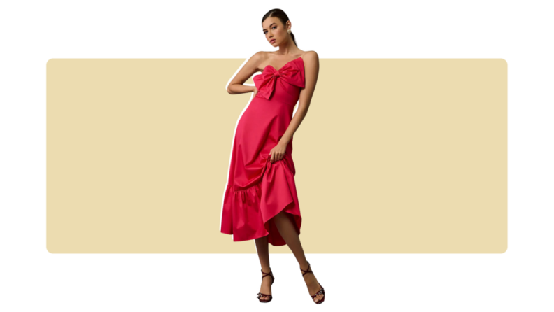 A red ankle-length dress with a large bow along the bust.