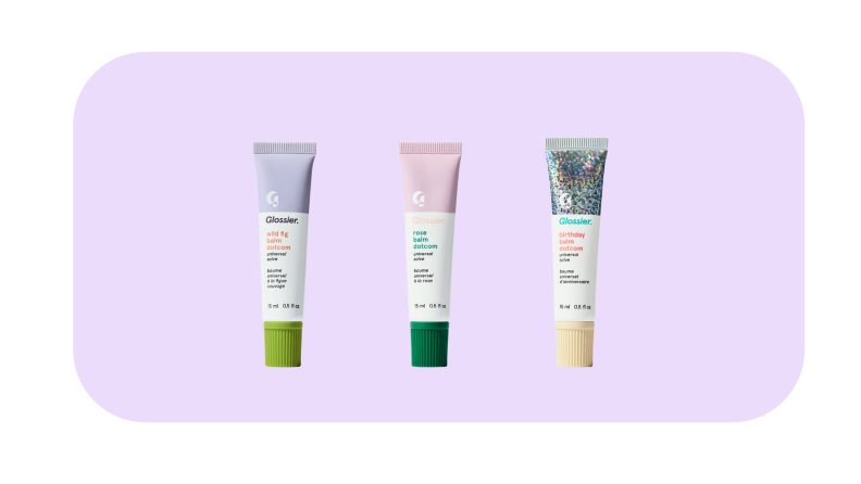 Three Glossier Balm Dotcoms against a light purple background.