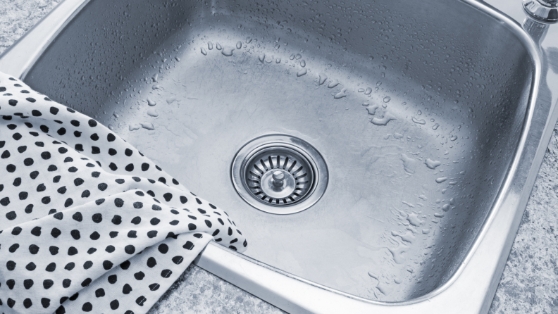 An empty stainless steel sink.