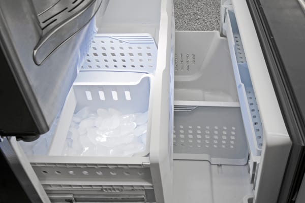 The GE Profile PFE28RSHSS's spacious pull-out freezer also comes with an unusually designed ice bucket.