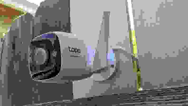 The Tapo camera mounted on a wall.