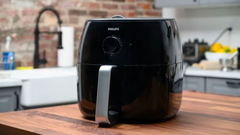 A Philips air fryer on a countertop.
