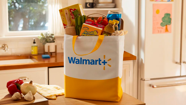 Photo of Walmart shopping bag filled with groceries.