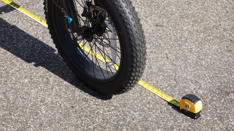 Using a tape measure to record the stopping distance of the Lectric XP 3.0