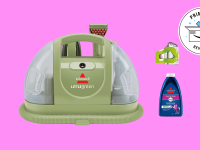 The Bissell Little Green Portable Carpet Cleaner against a pink background