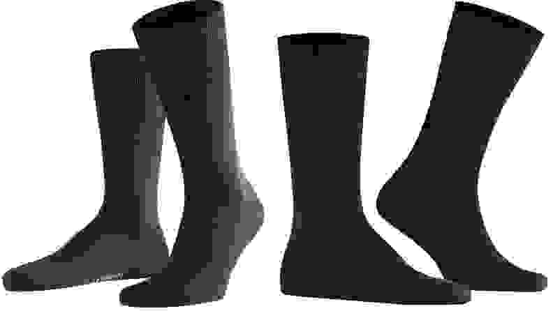 Pair of Falke socks being modeled in black.
