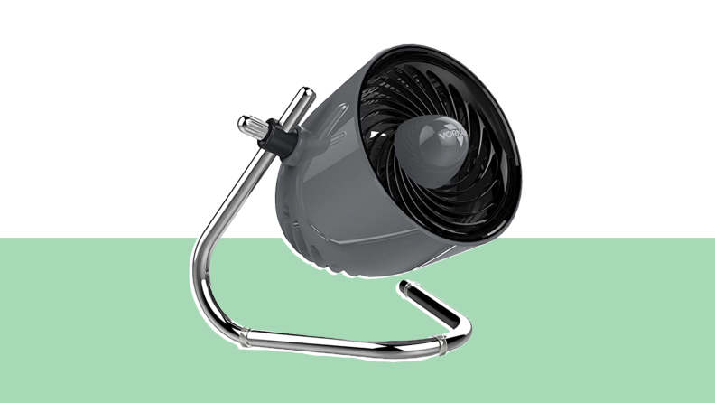 The Vornado fan in front of a background.