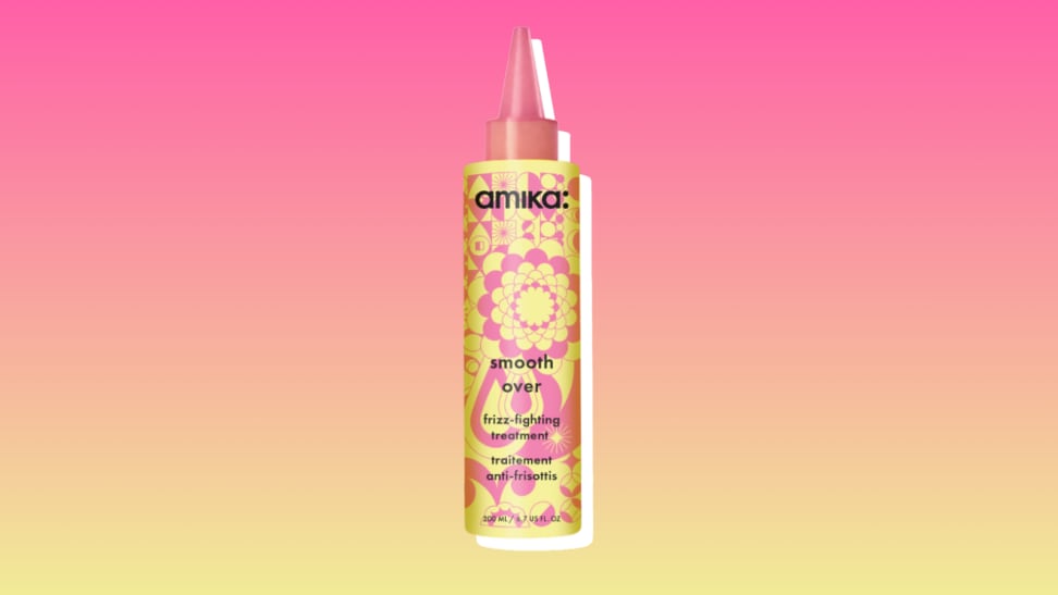 Amika frizz-fighting hair treatment against a pink and yellow background.