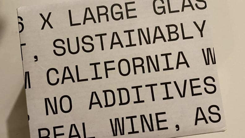 Usual Wines packaging, which features largely printed words about the product.