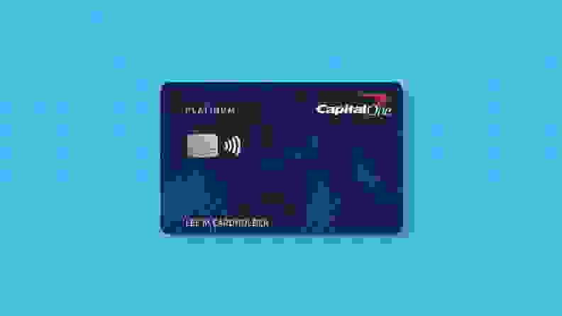 Capital One Platinum Secured credit card on a blue background