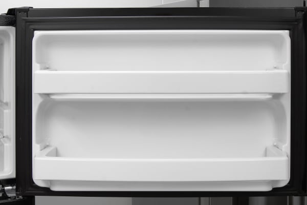 Standard fixed shelves are found on the freezer door of the GE GIE16DGHBB.