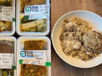 Four packaging of vegan Fresh N Lean meals next to a prepared meal in a bowl.