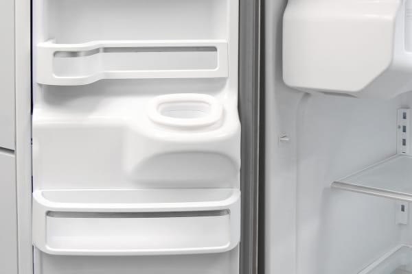 Storage on the left fridge door is distorted to accommodate the KitchenAid KFXS25RYMS's ice dispenser chute.