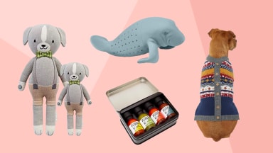 Close up product shots children's plush dolls, manatee tea bag, hot sauce variety pack, and dog wearing faux cardigan.