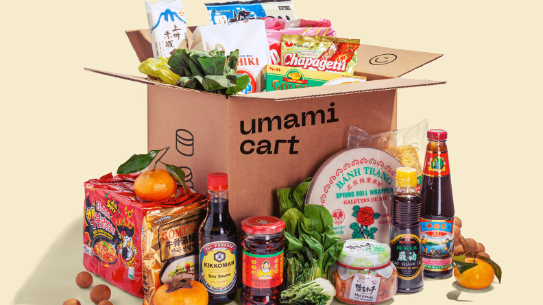 A box of Umamicart delivery can include a variety of Asian condiments, snacks, and fresh produce.