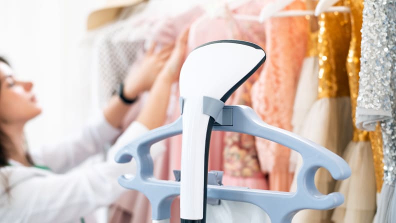 Woman drycleaning dress