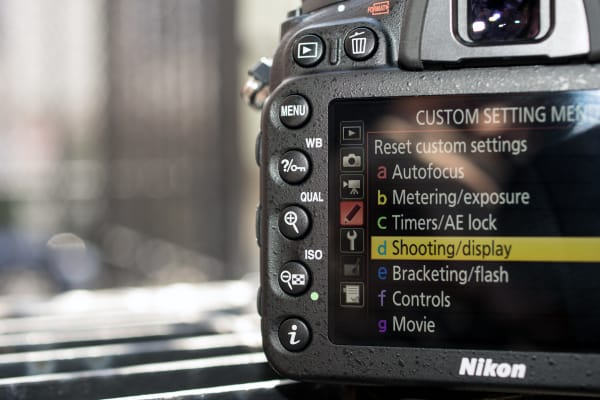 The left controls have quick functions for ISO, quality, and white balance.
