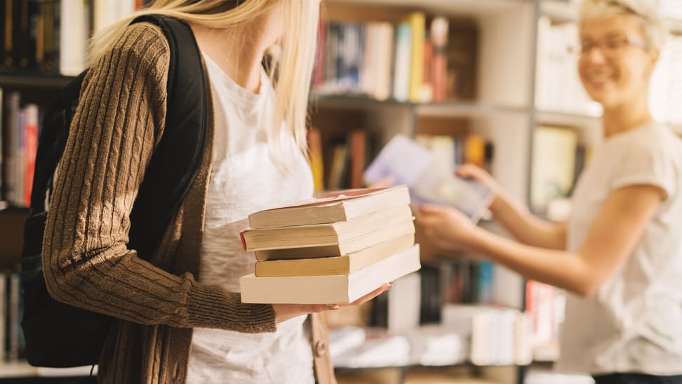 Two women interacting in a book store