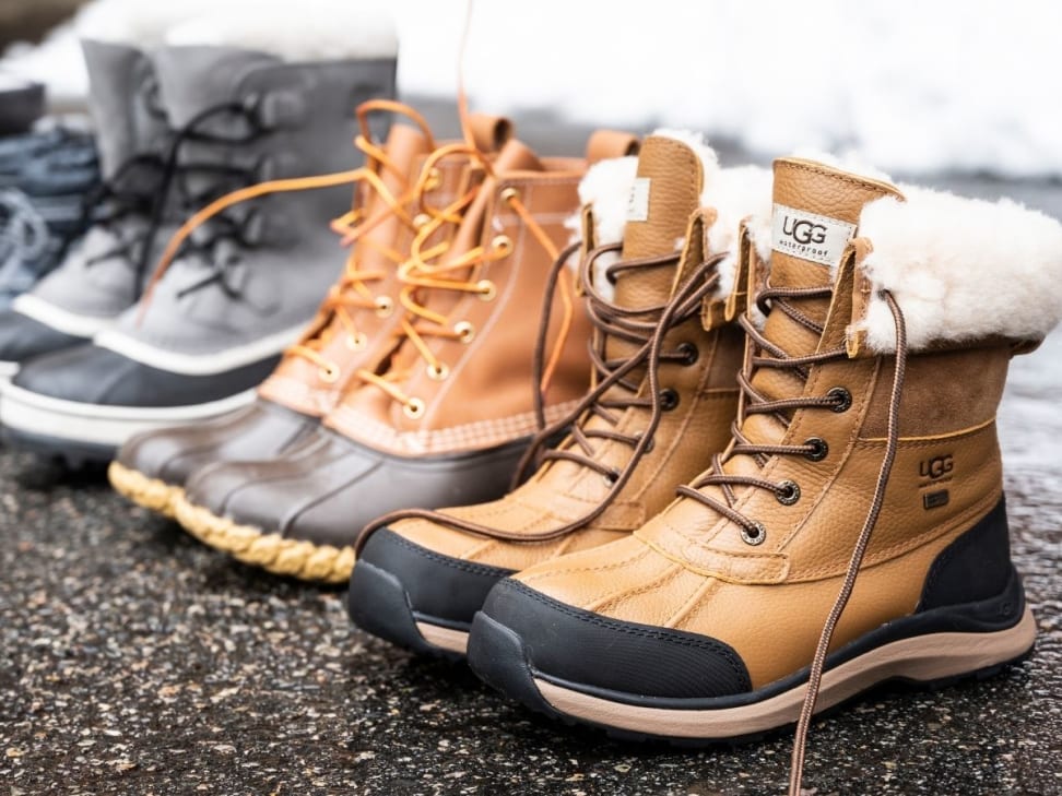 Premium Photo | New womens leather brown waterproof hiking winter autumn  boots in hands of female, trendy footwear for winter. unpacking shoes,  shopping online from home, shoe fashion store