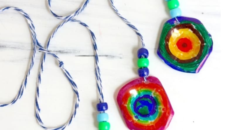 Necklace charms in many colors made from old plastic eggs crates