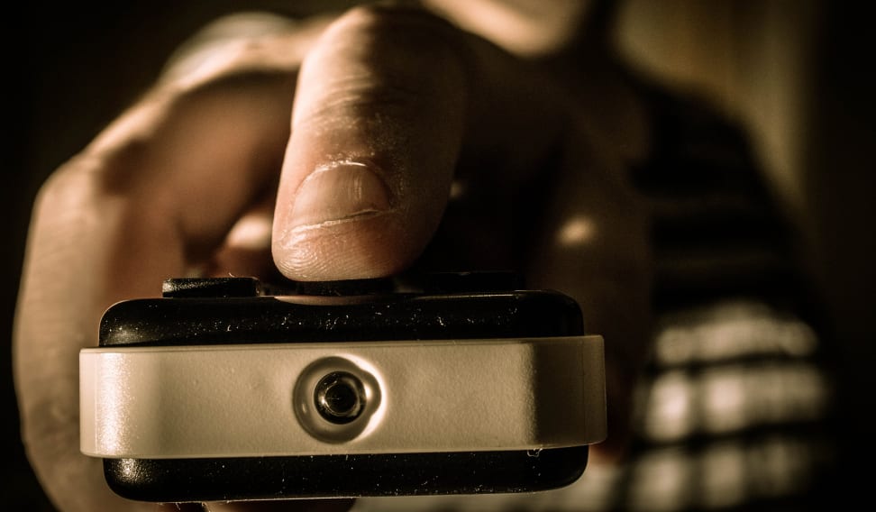 A man using a remote control