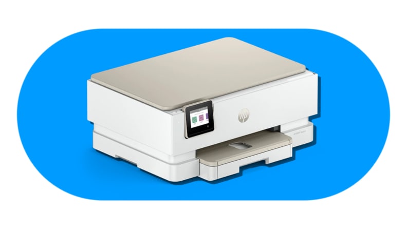 A beige-accented HP Envy Inspire printer displayed on a blue background, part of the HP Envy Inspire lineup.