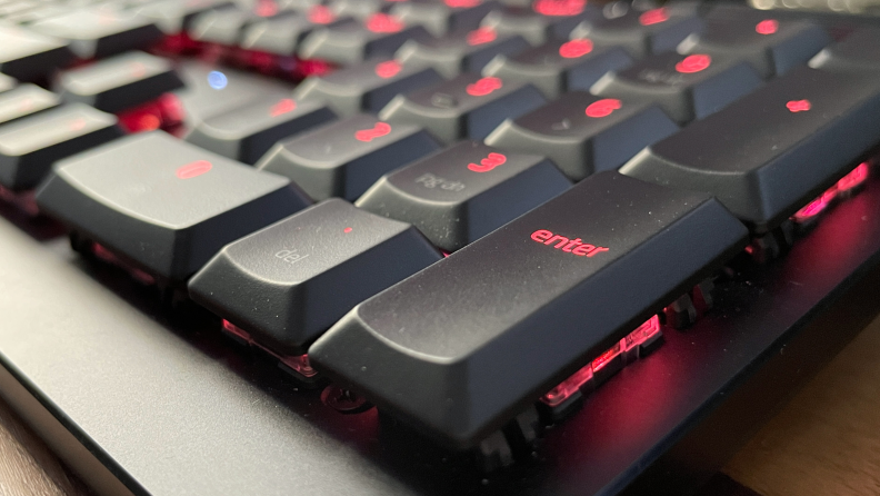 The keys on a Razer Deathstalker V2 Pro illuminate with red light.