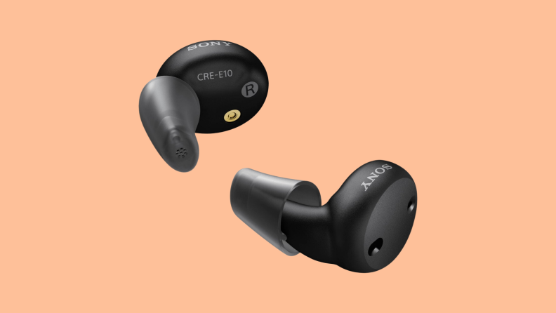 The Sony CRE-E10 hearing aids on an orange background.