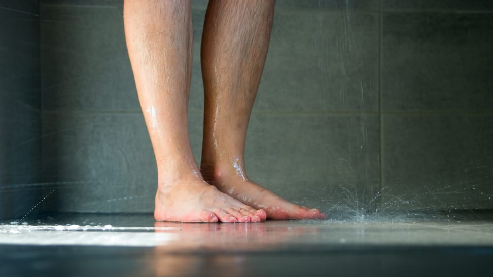 A Person Washing Their Feet