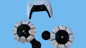 Two Playstation Access Controllers and a DualShock Controller against a blue background