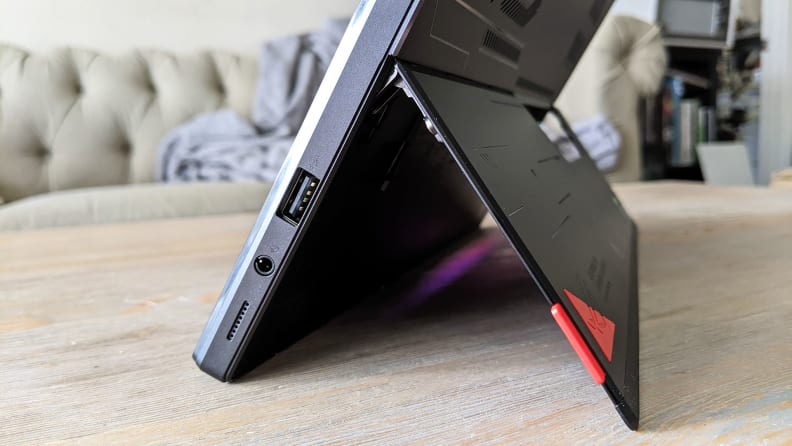 A side view of a tablet held up by its kickstand