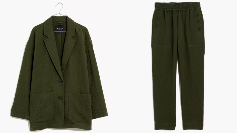 A dark green blazer and dark green pants.