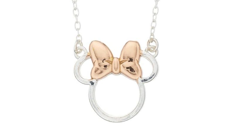 An image of a copper and silver Minnie Mouse necklace on a silver chain.