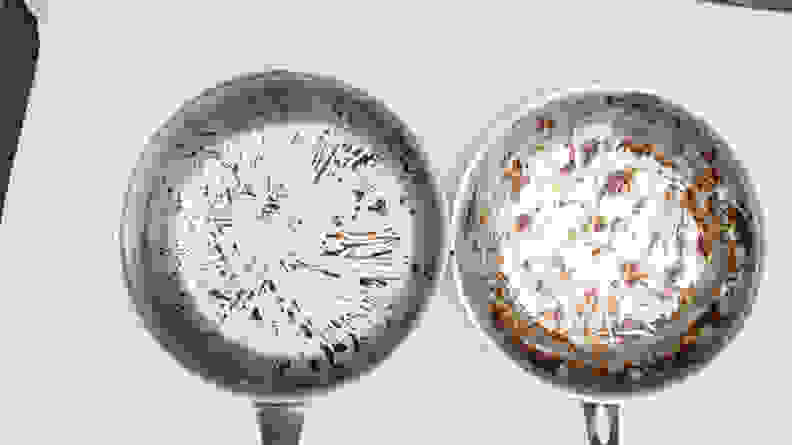 The pot with the tomato sauce stain (left) and the skillet with the brownie stain (right) soaked for 3 hours, and were then lightly hand-scrubbed.
