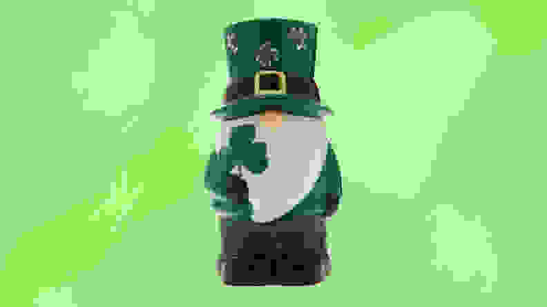 A St. Patrick's Day gnome in front of a green background.