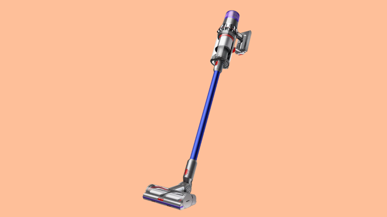 An image of a purple and gray Dyson stick vacuum.