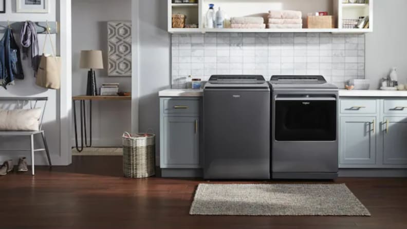 Grey Whirlpool WTW8127LC washer and matching dryer in a laundry room